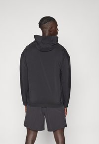 Puma ALWAYS ON FULL ZIP JACKET - Veste coupe-vent - black