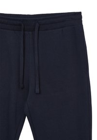 Marineblaue Jogginghosen aus weichem Baumwollstoff. Mit einem elastischen Bund mit Kordelzug und seitlichen Taschen.