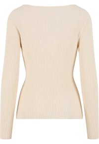 Bluza cu mâneci lungi, cu dungi, de culoare bej deschis, cu decolteu barcă și siluetă mulată, confecționată dintr-un material tricotat moale.