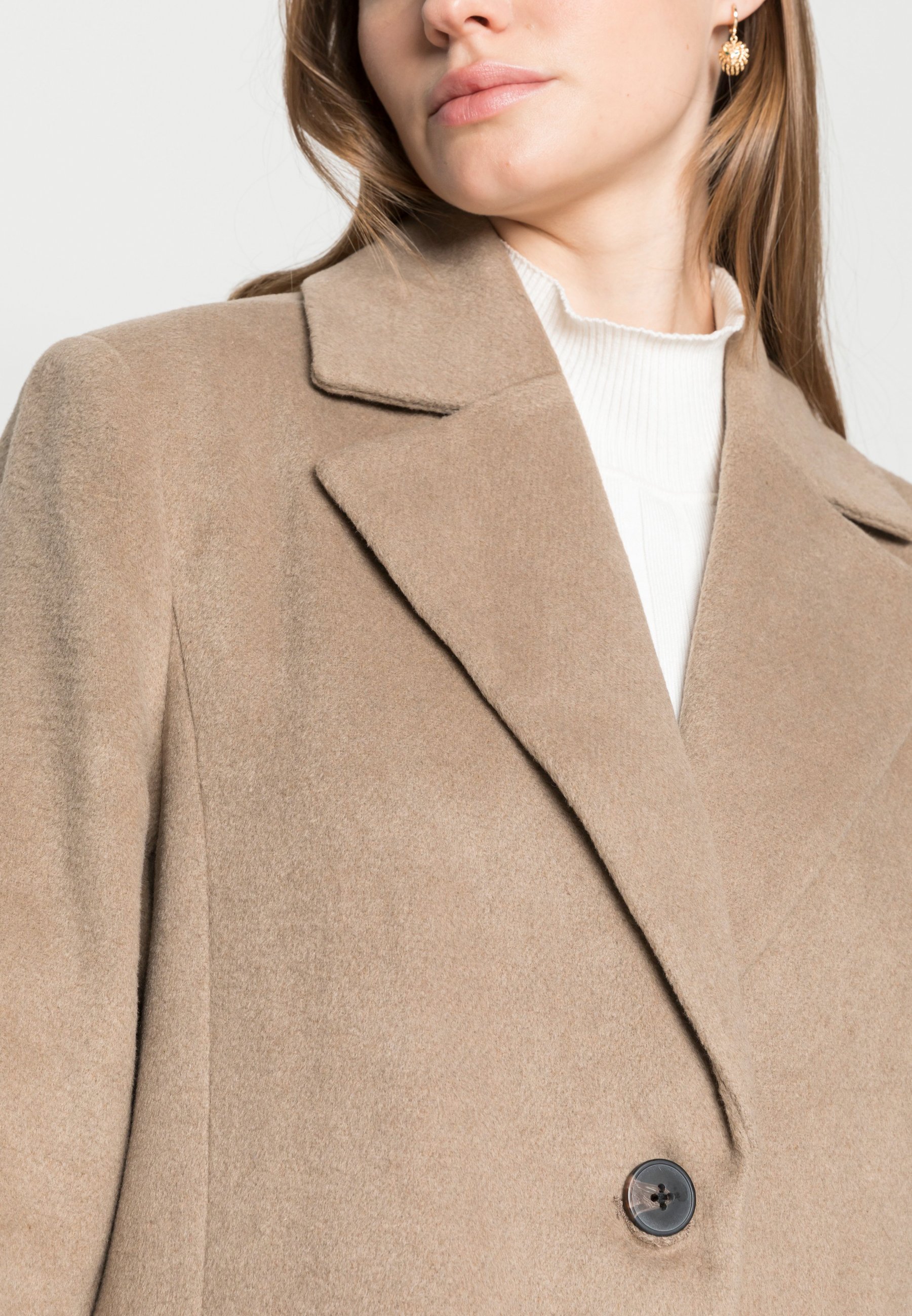 oversized beige jacket