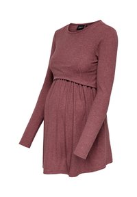 Top premaman a maniche lunghe, a coste, color rosa polveroso con bustino aderente e vita arricciata per accogliere il pancione.