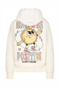 Crèmekleurige hoodie met een grote, kleurrijke cartoon zon grafiek, tekst "ALTIJD POSITIEF ZIJN," en een ribbelrand. Beschikt over een capuchon met trekkoord.