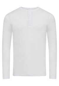 Hvid langærmet skjorte med rund halsudskæring og placket med tre knapper. Fremstillet af glat, let stof. Ingen mønstre eller dekorationer.
