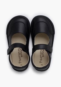 Zapatos Mary Jane de cuero negro con una correa en la parte superior, punta redondeada y plantilla acolchada. Tamaño 26 marcado en el interior. Textura suave.