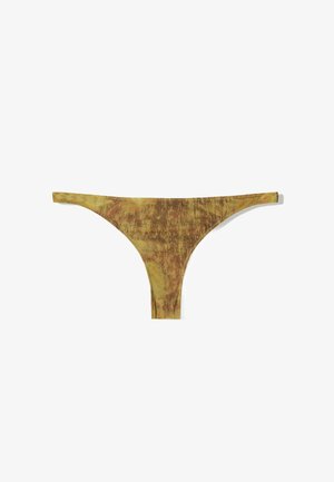 Thong underwear in earthy tones, featuring a textured fabric with a mottled pattern. Slim straps and a minimalistic design for coverage.
