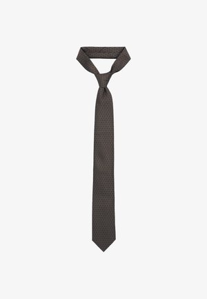 Ciemnobrązowy krawat z geometrycznym wzorem w jaśniejszym odcieniu. Materiał wydaje się gładki, ma klasyczny krój i zwężony koniec.