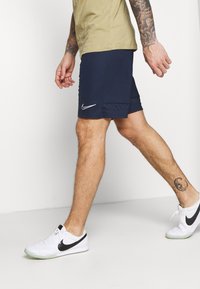 Nike Performance Calções desportivos - obsidian/white
