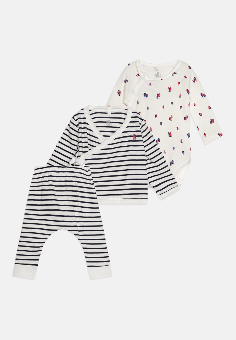 Three-piece baby outfit set: one white long-sleeve onesie with small sailboat print, one navy and white striped wrap top, and matching striped pants.