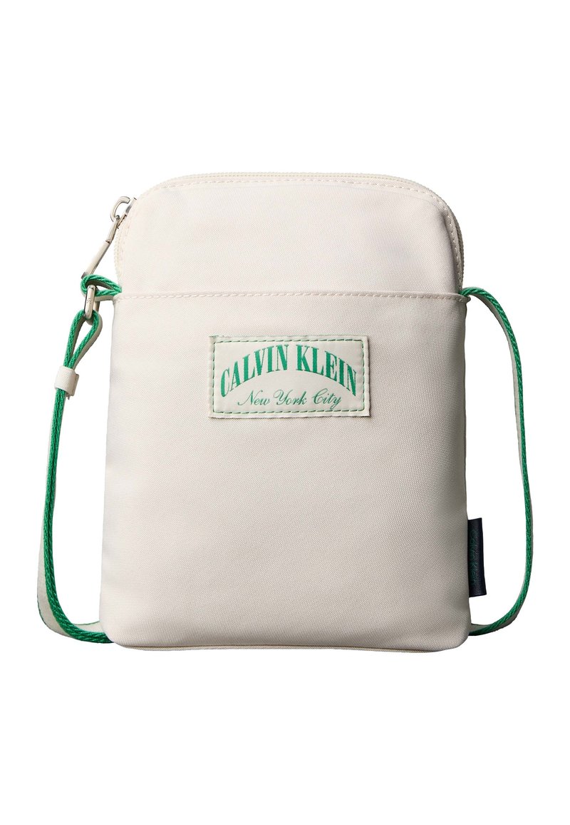 Calvin Klein CAPSULE REPORTER - Cross body bag - bone white/off-white ...