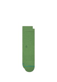 Groene katoenen sokken met een gladde textuur, voorzien van een eenvoudig ontwerp, een blauwe accent near de teen en een klein logo aan de zijkant.
