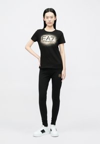 EA7 Emporio Armani Leggingek - Nadrágok - black/rose gold-coloured