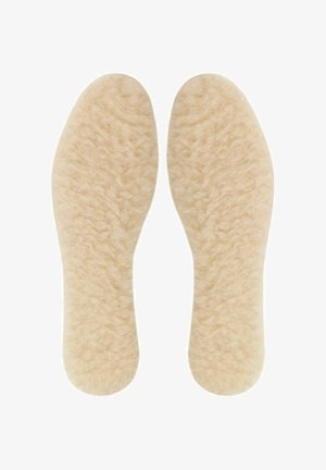 Beige wool insoles with a soft, textured surface, shaped for foot contours. Features a smooth outline and slightly raised edges for fit.