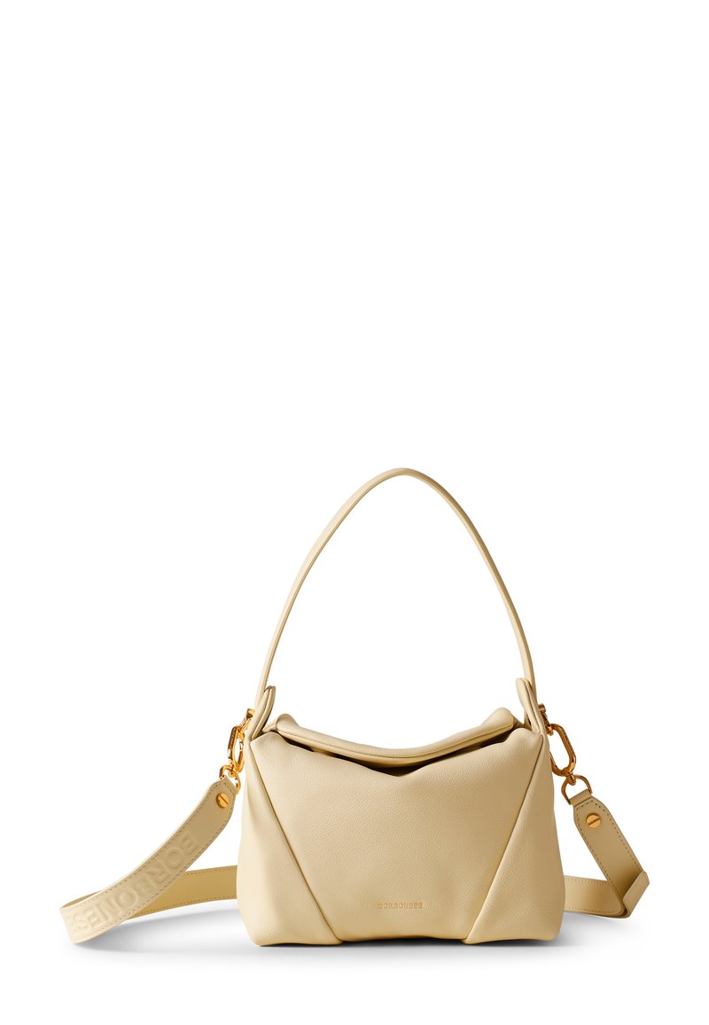 Beige leather handbag with a structured design, curved top, and gold hardware. Includes a detachable strap featuring a logo.