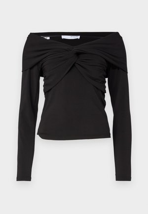 Čierny dlhý rukáv top s dizajnom bez ramienok, s krúteným uzlom vpredu a hladkým, elastickým materiálom.