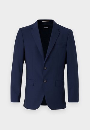 Jūrinis pritaikytas švarkas su dviem mygtukais, apykakle ir uždėtinėmis kišenėmis. Lygus paviršius su minimalistiniu dizainu. Prekės ženklas matomas viduje.