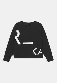 Černá mikina s bílým grafickým potiskem, obsahující abstraktní písmena. Kulatý výstřih, dlouhé rukávy a vroubkované manžety. Měkká textura.