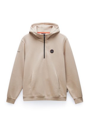 Beige huppari etu vetoketjulla, nyörilistalla varustetulla huppulla ja sivutaskuilla. Rintakehässä on pyöreä logo ja ribbauskankaiset hihansuut. Pehmeä rakenne.