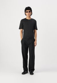 Jack & Jones JPSTBILL JJDAYTONA WIDE - Trousers - black