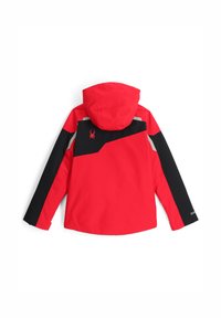 Rot-schwarze Jacke mit Kapuze, die ein geometrisches Design aufweist, eine weiche Textur hat und ein Spinnenlogo auf dem Rücken trägt, geeignet für Outdoor-Aktivitäten.