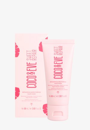 Rosa hårmasktub med en texturerad kapsyl, märkt "Coco & Eve Sweet Repair." En box med blommönster följer med. Båda har fet typografi.
