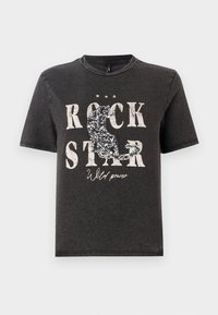 Must must värvitud T-särk, millel on julge valge tekst "ROCK STAR" ja sädeleva kassi siluett. Ümmargune kaelus ja lühikesed varrukad.