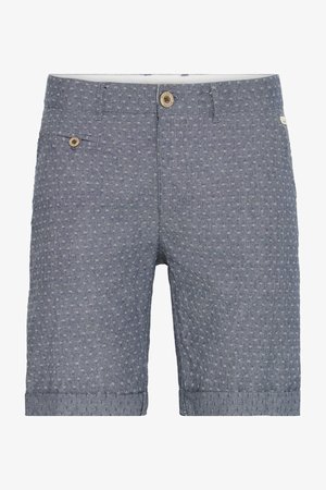 Férfi kék mintás bermuda, texturált anyagból készült. Gombos záródással és egy oldalsó zsebbel rendelkezik, feltekert szárakkal a laza megjelenésért.
