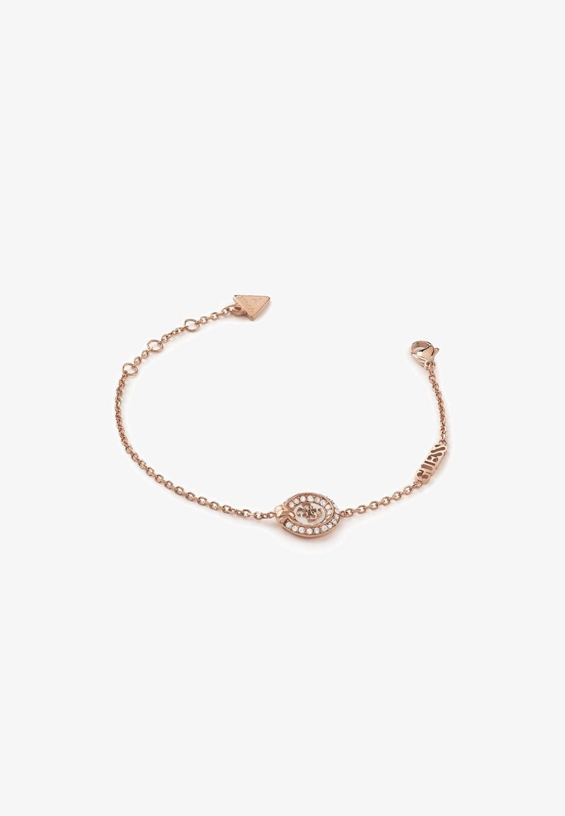 Rose gold bracelet with a delicate chain and oval pendant, featuring clear rhinestones and a triangular charm at the clasp.