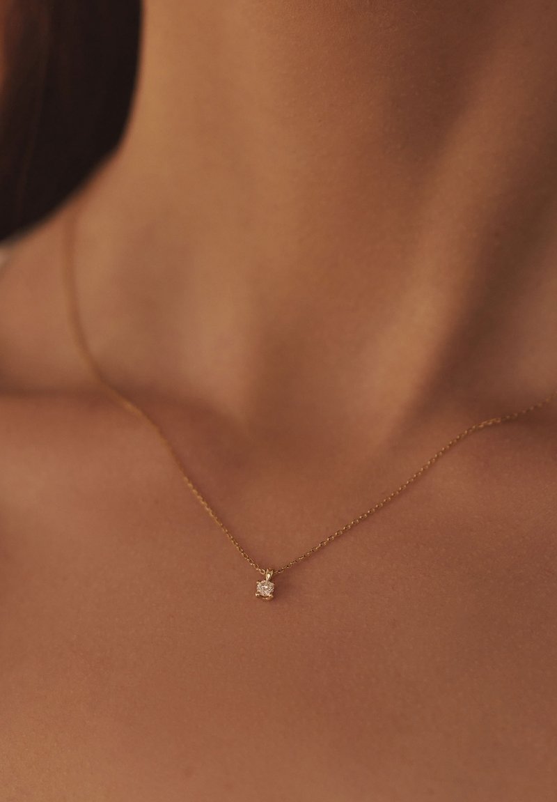 Isabel Bernard Ketting - gold coloured