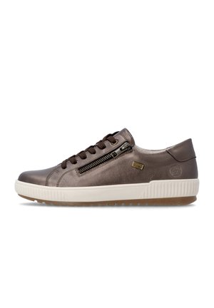 Brown leather sneaker with white sole, dark laces, side zipper, small gold logo, and textured rubber grip on the bottom.