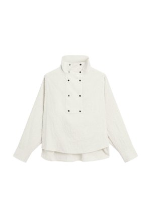 Ripstop stoffen pullover in lichtbeige met een hoge kraag en drukknoopdetails. Heeft lange mouwen en een iets cropped achterkant.