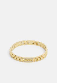 Bracelet en or élégant avec des maillons arrondis et un fermoir rectangulaire orné de cristaux transparents. Fini lisse et brillant sur toute la surface.
