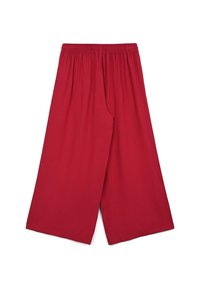 Pantaloni ampi rossi in tessuto morbido; presentano una vita elasticizzata e nessun attacco visibile; texture liscia con un colore uniforme.
