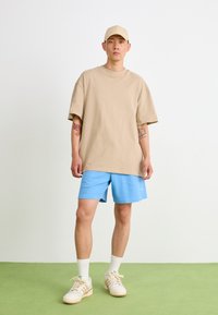 adidas Originals Tracksuit bottoms - light blue