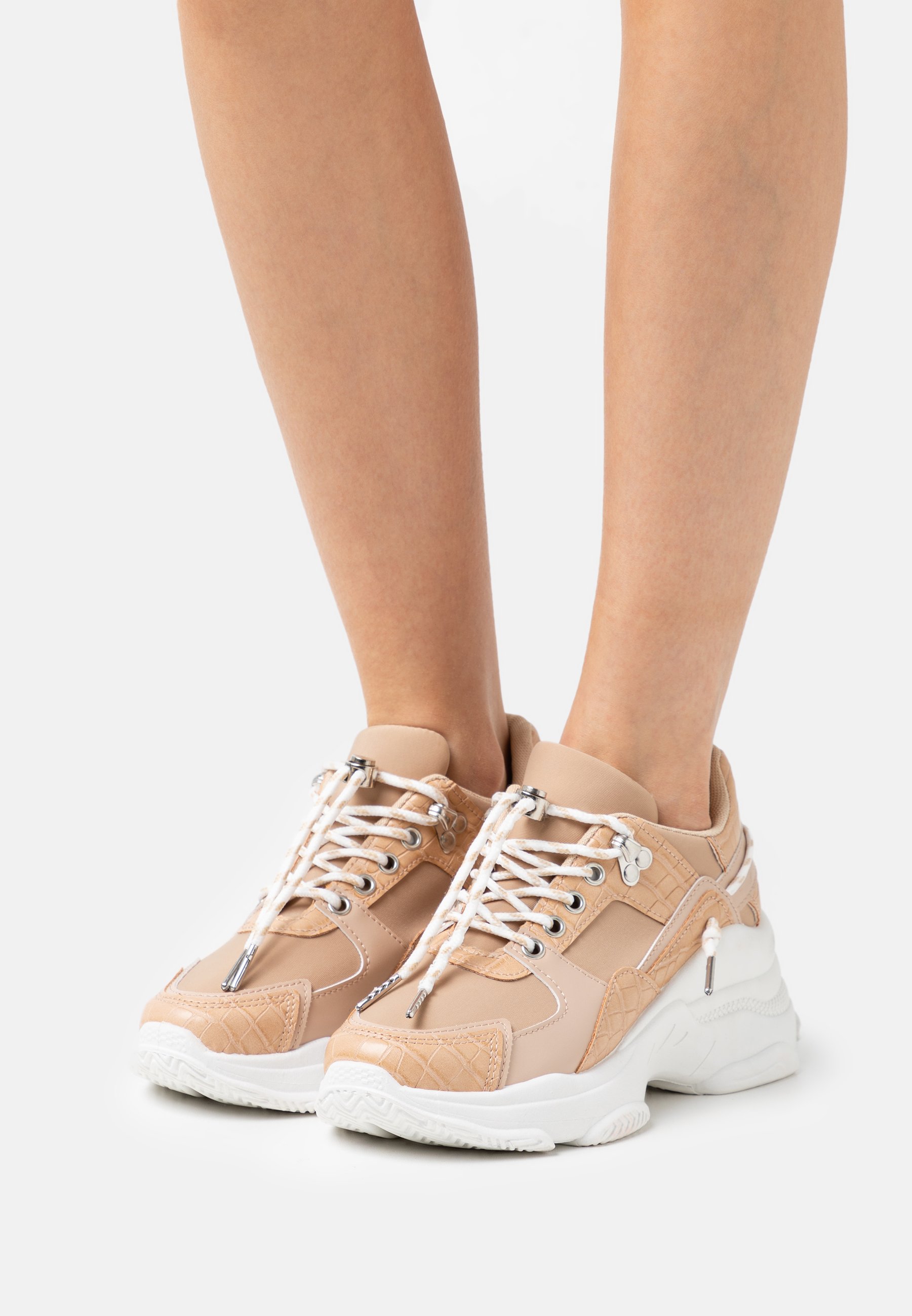 nude beige trainers