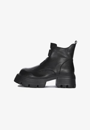 Filippo - Botki na platformie