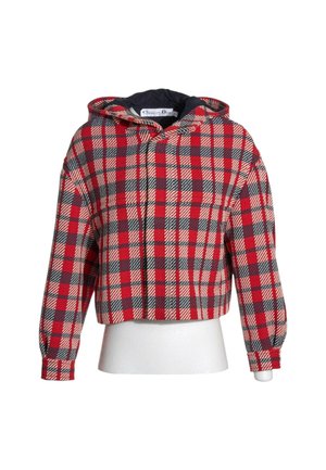 Rot, schwarz und weiß kariertes Kapuzenjacke mit langen Ärmeln und kurzem Schnitt, dargestellt auf einem weißen Schaufensterfiguren-Torso.