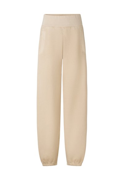 Beige sweatpants med en bred elastisk talje, to sidelommer og elastiske manchetter ved anklerne, lavet af blød, letvægtsstof.
