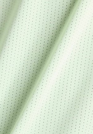 Hellgrüner Stoff mit einer glatten Textur, der ein regelmäßiges Muster aus kleinen schwarzen Punkten aufweist, die in vertikalen Reihen angeordnet sind.