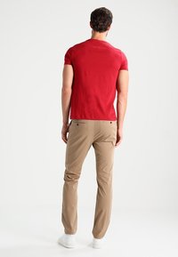 Tommy Hilfiger Housut - tan