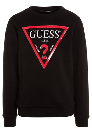 Sweat-shirt noir à manches longues avec un grand logo triangle rouge sur la poitrine affichant "GUESS U.S.A." et un point d'interrogation rouge à l'intérieur.
