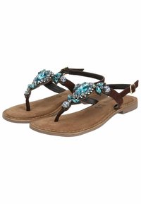 Sandali in suede marrone con cinturini regolabili, dettagli gioiello in turchese e trasparente, suola piatta e design con inserto tra le dita.