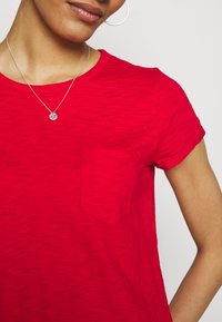 GAP Trikoomekko - red