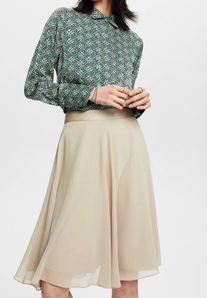 Falda acampanada - green