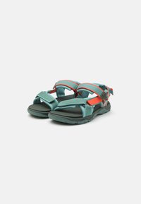 Teal and orange sports sandals with adjustable straps, padded footbed, and textured rubber outsole for grip and durability.