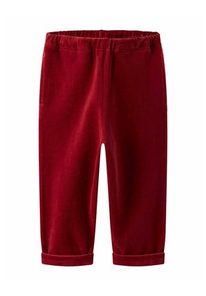 Pantalons en velours rouge avec une taille élastique, poches avant et ourlets retroussés. Texture douce et coupe droite. Idéal pour un look décontracté.