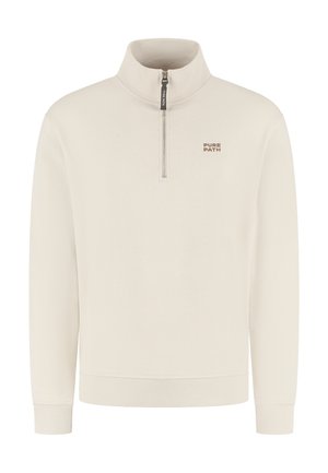 White fleece pullover with a high collar, half-zip closure, and ribbed cuffs and hem. Features "PURE PATH" logo in brown.