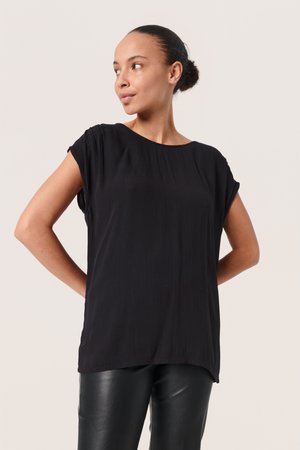 Black short-sleeve top with a relaxed fit, made of textured fabric, featuring a wide neckline and slightly curved hem.