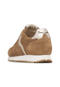 Brown suede sneaker with metallic gold accents, featuring a white rubber sole and a minimalist design. Rear view showcases smooth lining and logo.