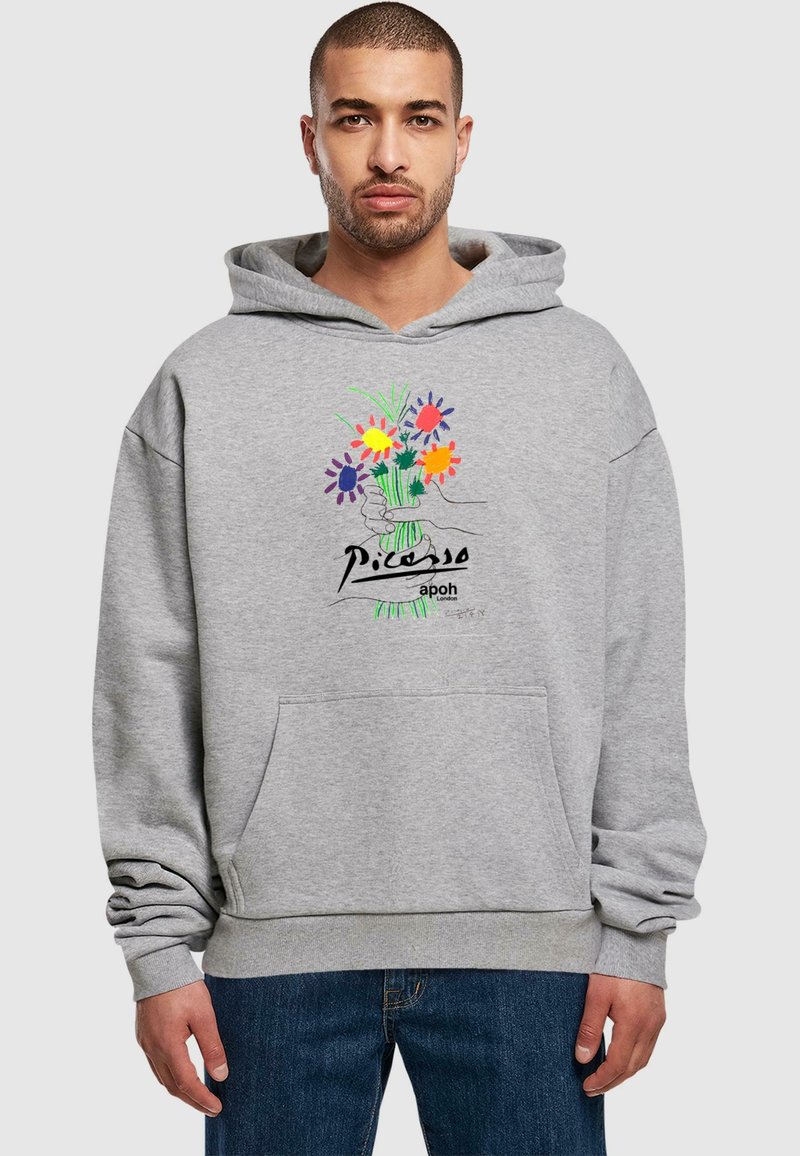 Felpa grigia con un design di fiori colorati e testo "Picasso apoh". Include una tasca frontale e polsini a costine per maggiore comfort.
