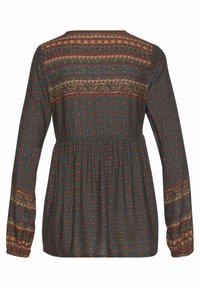 Langärmlige Tunika in dunklem Teal mit aufwendigen goldenen, burgunderfarbenen und grünen Mustern; geraffte Taille und elastische Bündchen; strukturierter Stoff.